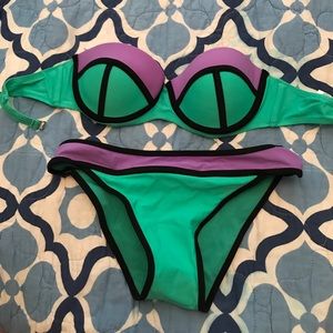 Never worn triangl-like bathing suit size medium